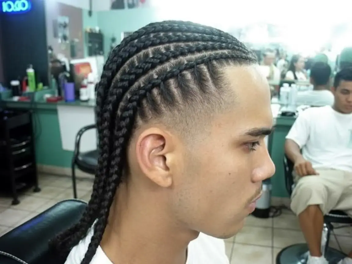 #13. Tight Tapered Cornrows with Mid Fade