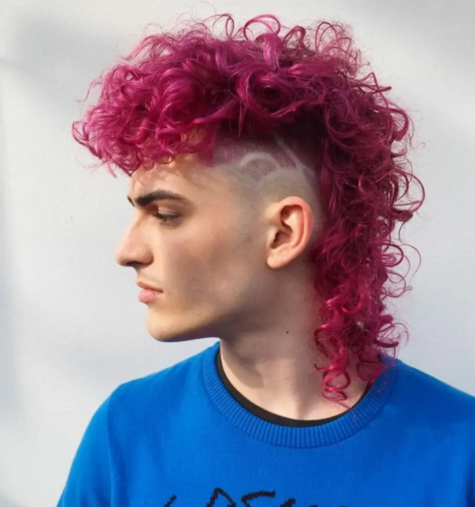 #4. Electric Magenta Curly Mohawk with Hair Tattoo